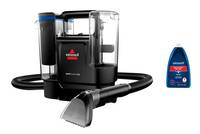 Ein schwarz-blauer Staubsauger mit durchsichtigem Staubbehälter und Schlauchaufsatz. Das Bissell-Logo ist auf dem Gerät sichtbar.