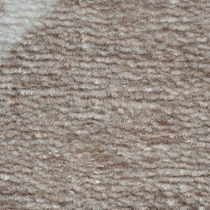 Nahaufnahme von beige und hellbraun strukturiertem Stoff mit einem weichen, gewebten Muster.