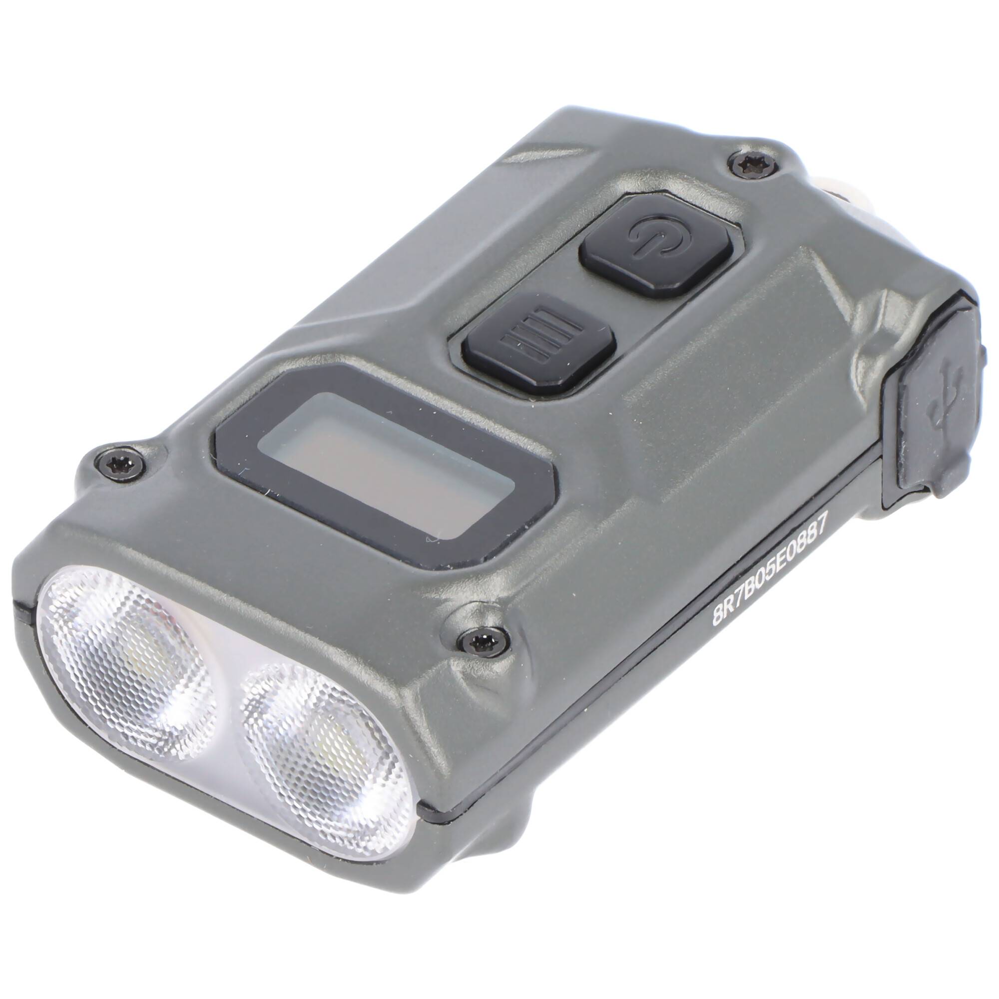 Eine graue, rechteckige LED-Taschenlampe mit Doppellinsen, einem Ein-/Ausschalter und einem digitalen Display auf ihrer Oberfläche, entwickelt für tragbare Verwendung.