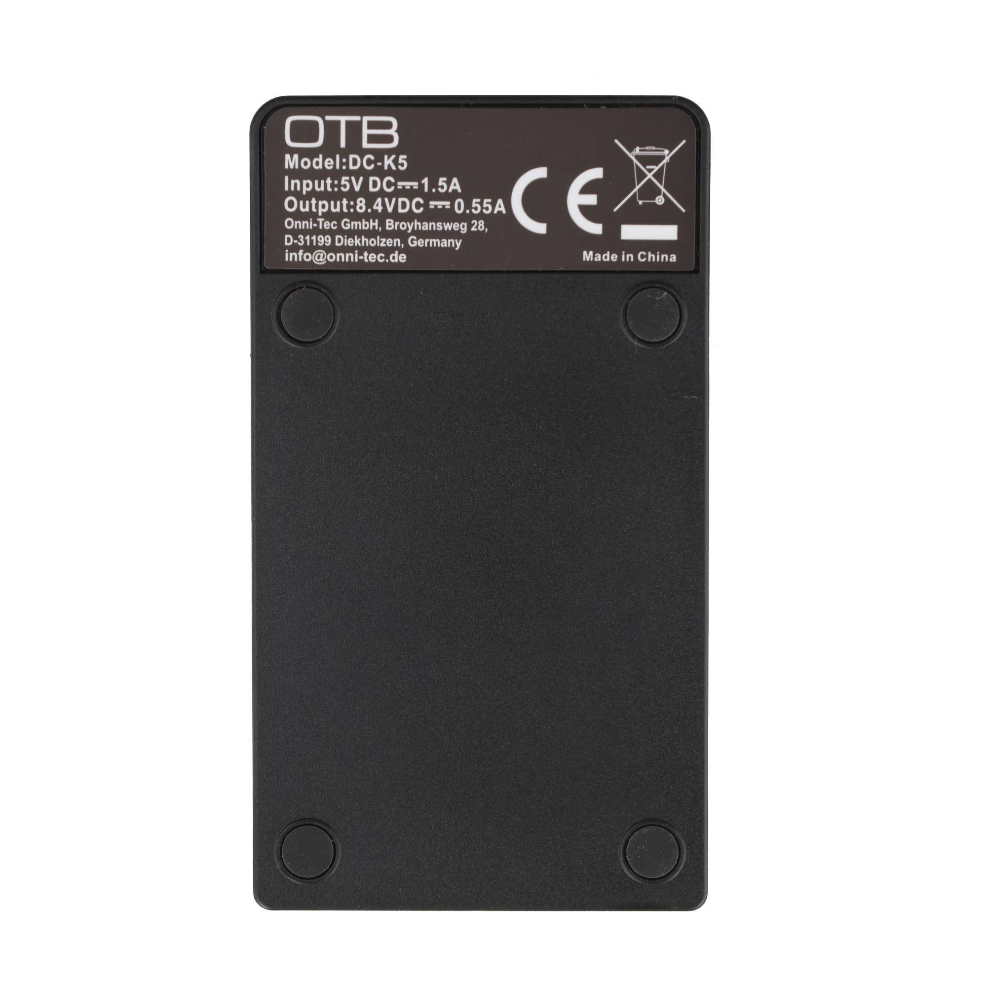 Rückseite eines schwarzen OTB DC-DC5-Geräts mit Produktetikett, Modellnummer, elektrischen Ein-/Ausgangsspezifikationen und Konformitätskennzeichnungen.