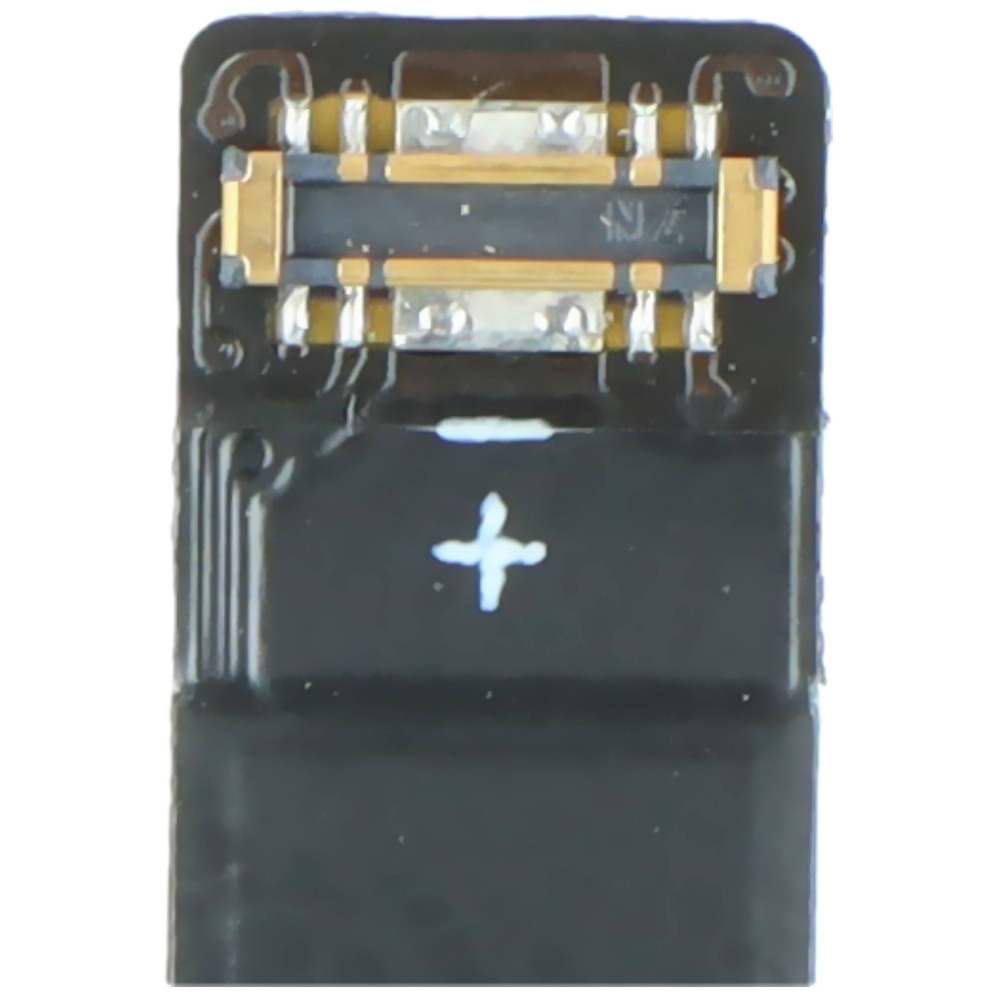 „Eine Nahaufnahme einer kleinen elektronischen Komponente mit metallischen Kontakten und sichtbaren Schaltungsdetails auf ihrer Oberfläche.