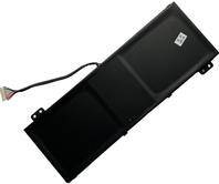Eine rechteckige schwarze Laptop-Batterie mit einem auf der linken Seite angebrachten Steckkabel, von oben auf weißem Hintergrund betrachtet.