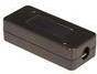 Ein kleines, rechteckiges schwarzes Kunststoffgerät mit einem Anschluss auf einer Seite, möglicherweise eine elektronische Komponente oder ein Zubehörteil.