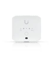 Ein weißes elektronisches Gerät mit Anzeigelichtern und einer zentralen Taste. Es zeigt ein 