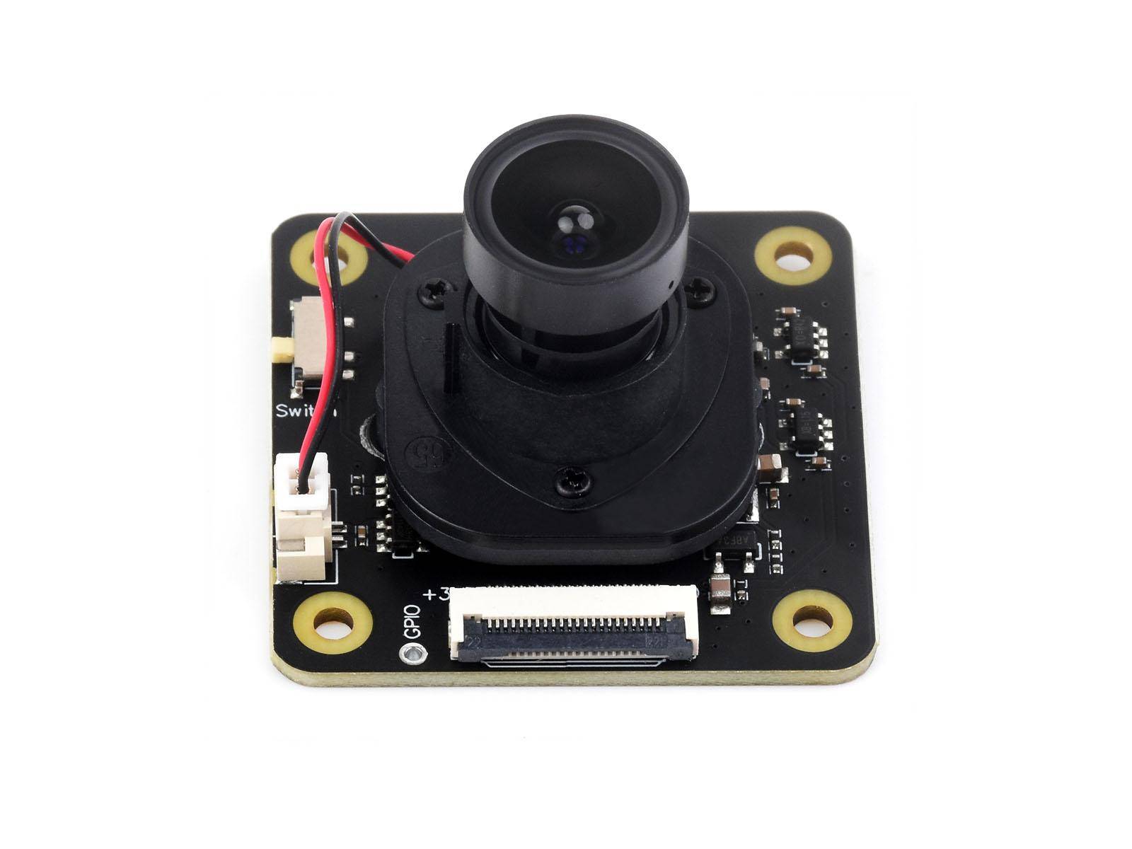 „Eine kleine quadratische Leiterplatte mit einem Kameraobjektiv in der Mitte, umgeben von elektronischen Komponenten und Steckverbindern.