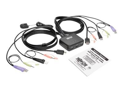 Ein schwarzer HDMI-KVM-Schalter mit mehreren Kabeln und Anschlüssen, einschließlich USB- und Audio-Buchsen, zusammen mit einer gedruckten Benutzeranleitung.