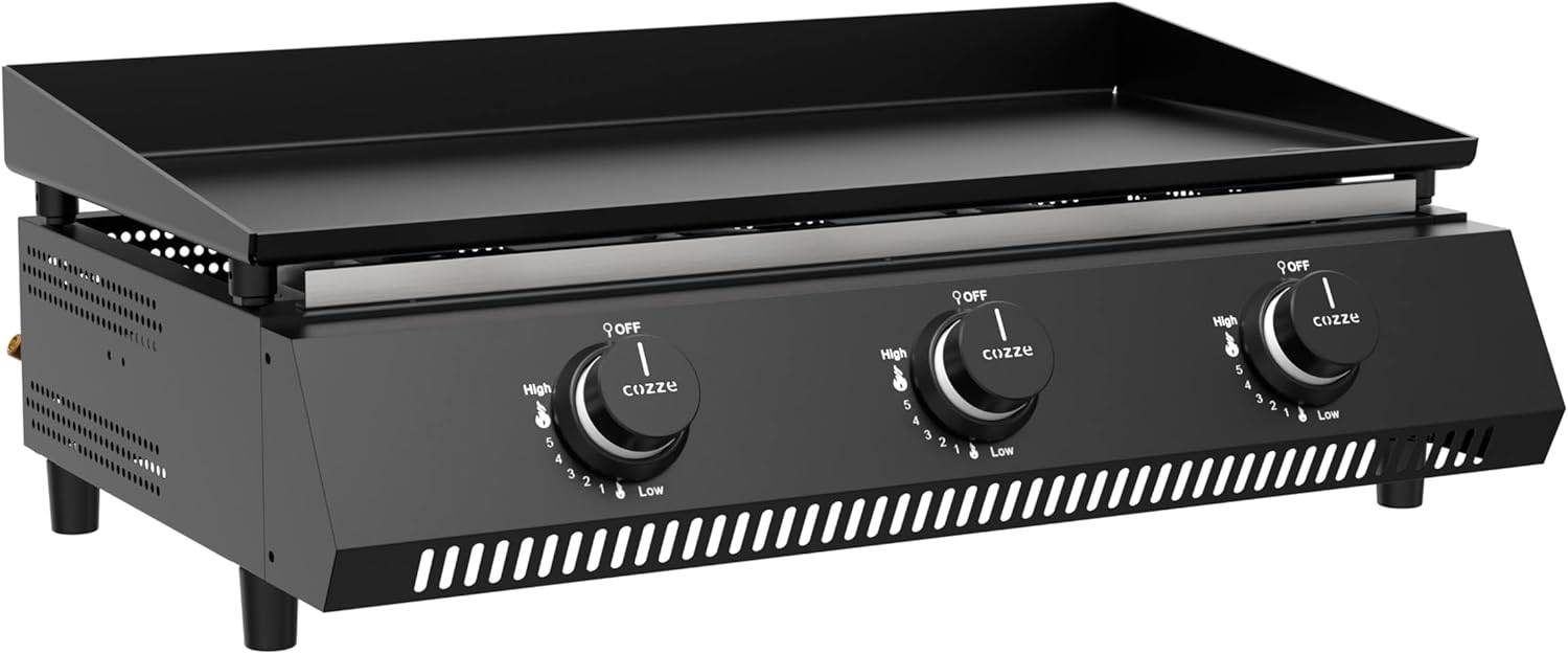 Eine Nahaufnahme eines schwarzen Kochfeld-Bedienfelds mit zwei runden Drehknöpfen, die jeweils mit „Cizzle