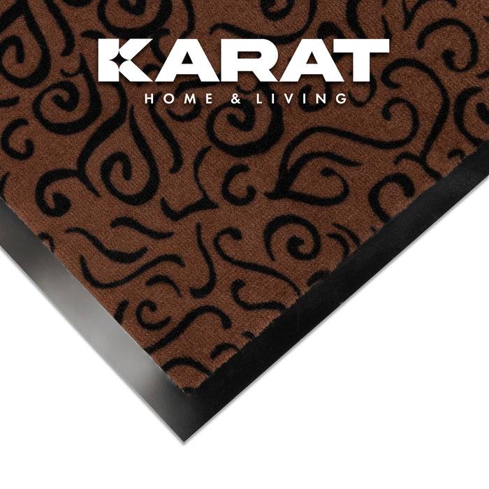 Braun-schwarzer gemusterter Teppich mit Wirbeln, beschriftet mit „Karat Home & Living