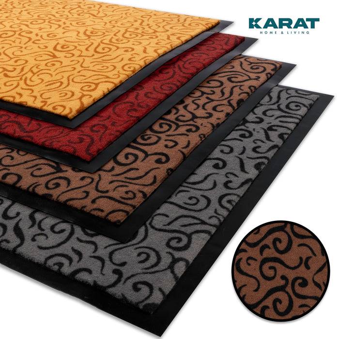 Stapel aus vier Teppichen in Gelb, Rot, Braun und Grau mit Wirbelmuster, Marke „Karat Home & Living