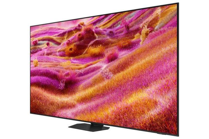 Ein großer, moderner Fernseher zeigt einen lebendigen Bildschirm mit abstrakten, farbenfrohen Wellen in Tönen von Rosa, Orange und Gelb.
