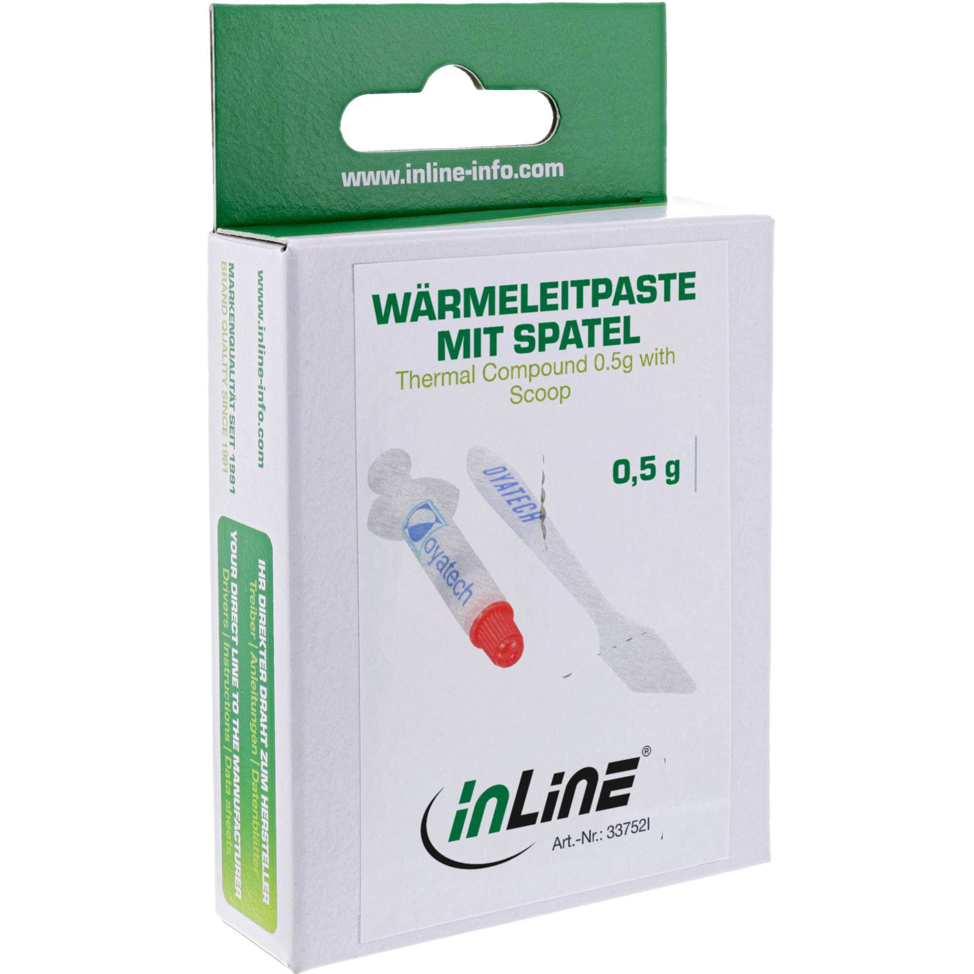 "Inline" Wärmeleitpaste-Packung, 0,5g mit Spachtel, grün-weiß Design, beschriftet in Deutsch und Englisch.