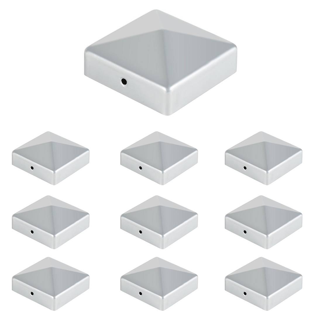 Zehn silberne, pyramidenförmige Objekte mit einem kleinen schwarzen Punkt auf einer Seite sind in einem Rastermuster vor weißem Hintergrund angeordnet.