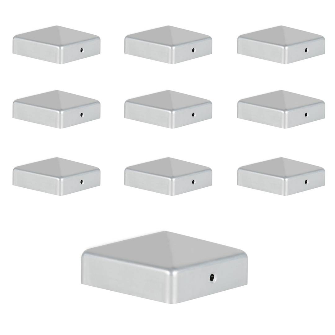 Satz aus neun silbernen pyramidenförmigen Kappen mit kreisförmigen Ausschnitten, in einem Raster angeordnet; die Kappe im Vordergrund wird prominent dargestellt.