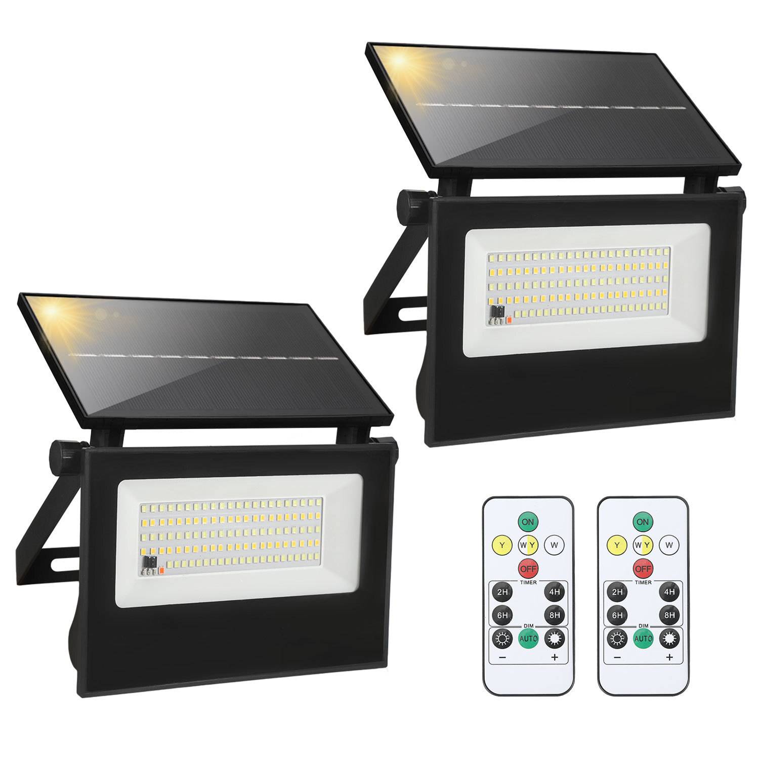Zwei Solar-LED-Flutlichter für den Außenbereich mit schwarzem Gehäuse, verstellbaren Paneelen und zwei Fernbedienungen zur Einstellung von Optionen.