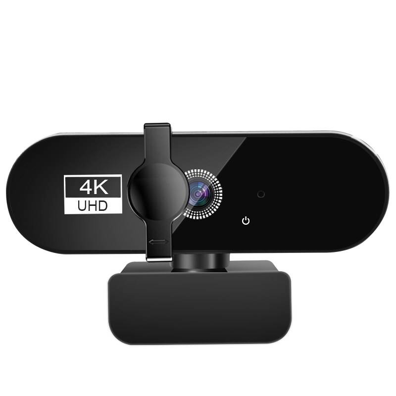 Eine schwarze 4K-UHD-Webcam mit Objektiv und Stromschalter auf der Vorderseite. Sie verfügt über eine verstellbare Halterung zum Anbringen an Monitoren oder Stativen.