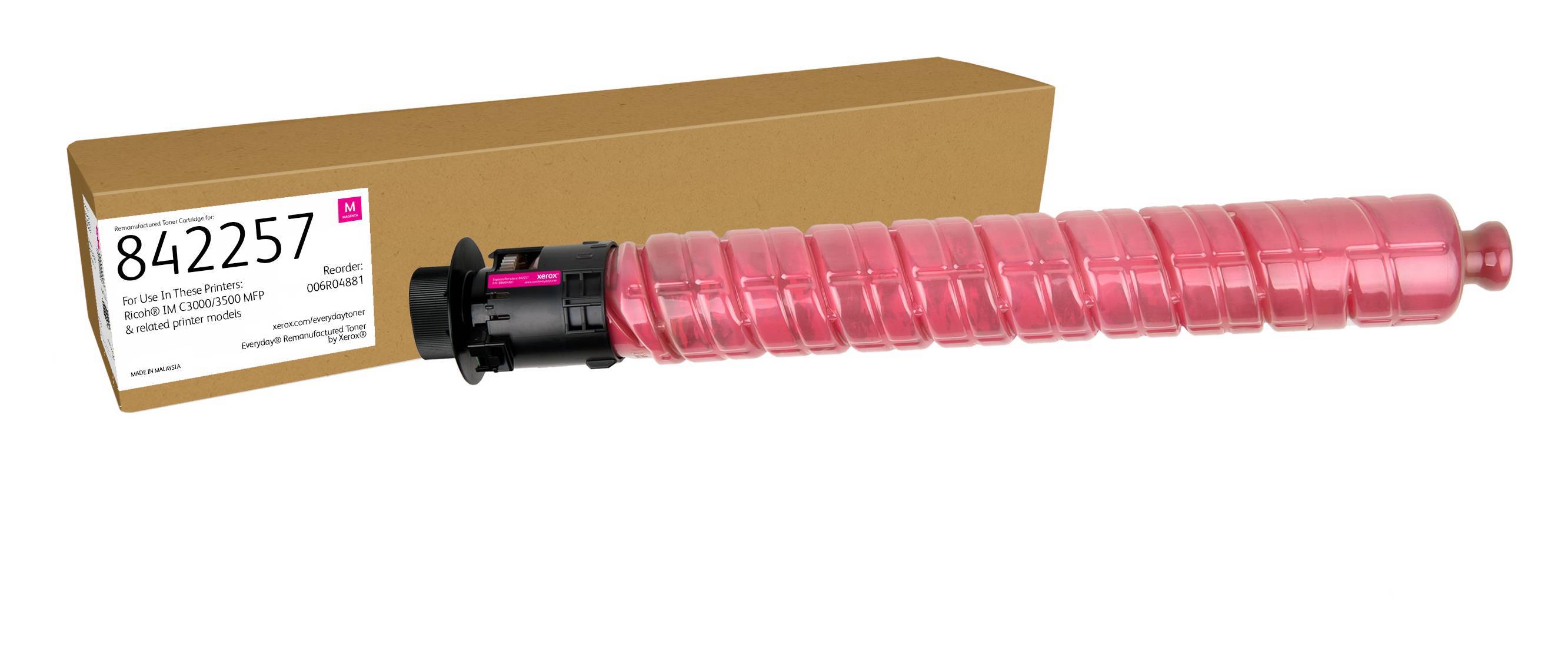 Eine rosa Druckertonerkassette vor einer schlichten Pappschachtel.