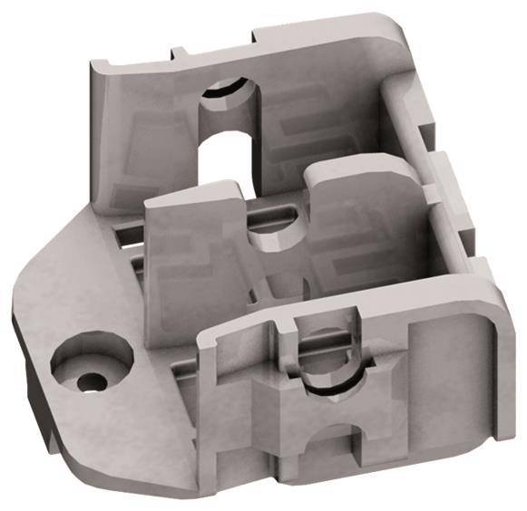 Ein grauer, kompliziert geformter Kunststoffeckverbinder mit mehreren Schlitzen und Löchern, der bei der Montage im Bauwesen oder in der Fertigung verwendet wird.