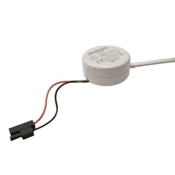 Ein rundes, weißes elektronisches Gerät mit roten und schwarzen Drähten und einem schwarzen Stecker. Das Gerät weist Text und Symbole auf seiner Oberfläche auf.