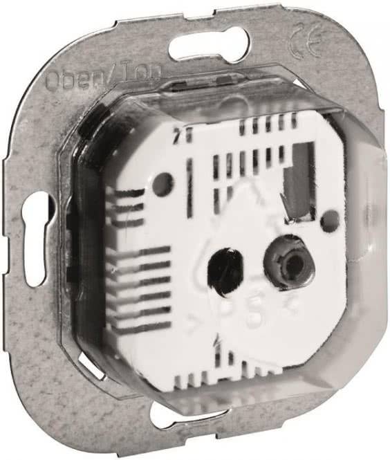 Elektrischer Wandsteckdosenmechanismus ohne Abdeckung, zeigt Verdrahtungspunkte und Montagekäfig.