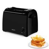 Ein schwarzer Toaster mit einem Drehregler steht neben einem Teller mit getostetem Brot.