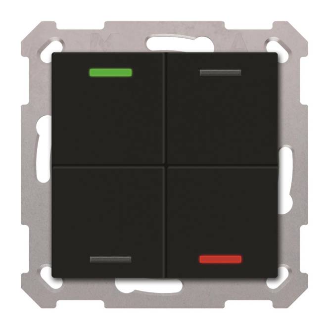 Ein schwarzer, vierknöpfiger Lichtschalter auf einem metallischen Befestigungsrahmen, mit kleinen grünen und roten Kontrollleuchten auf den oberen linken und unteren rechten Tasten.