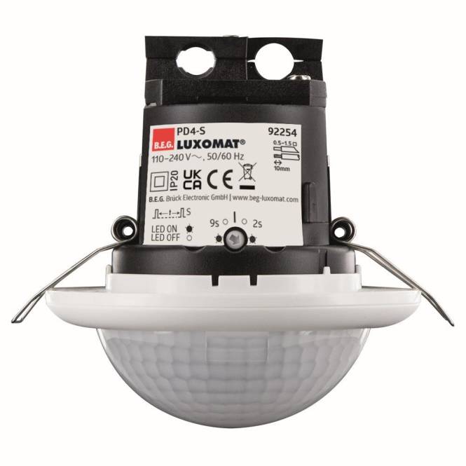 Deckenmontagefähiger Luxomat PD4-S Bewegungsmelder mit Kennzeichnung für 110–240V und 50/60Hz, mit LED-Anzeigen für den Betriebsstatus.