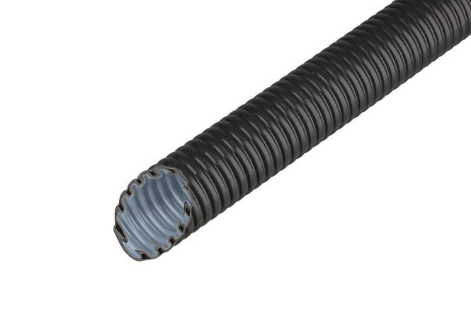 Nahaufnahme eines Schalters mit zwei Schaltern; der linke Schalter hat ein Stromsymbol mit Grün und der rechte hat Pfesilsymbole mit blauen Akzenten.