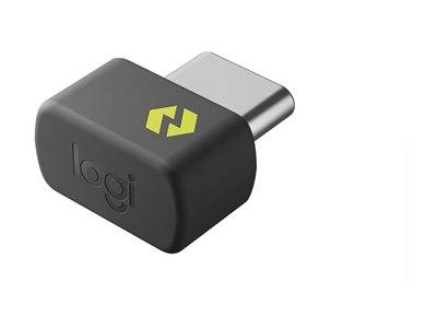 Ein kleiner schwarzer USB-Adapter mit USB-C-Anschluss, gekennzeichnet durch das „logi