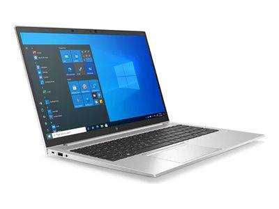 Ein silberner Laptop, auf dem der Windows 10-Startbildschirm mit verschiedenen Anwendungssymbolen angezeigt wird, auf einer weißen Oberfläche in einem Winkel positioniert.