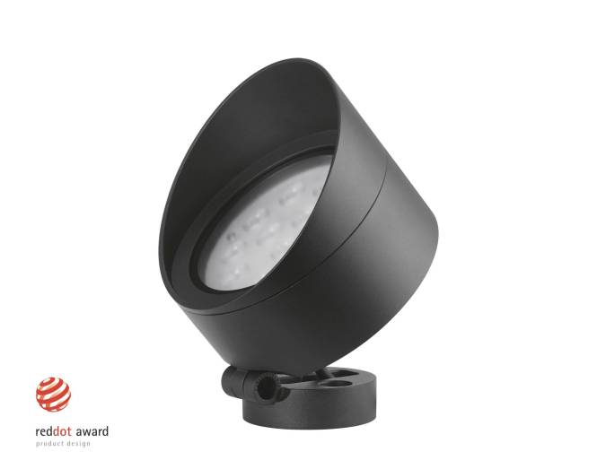 Ein schwarzer Scheinwerfer mit zylindrischem Design, montiert auf einer runden Basis. Das Logo des „Red Dot Award