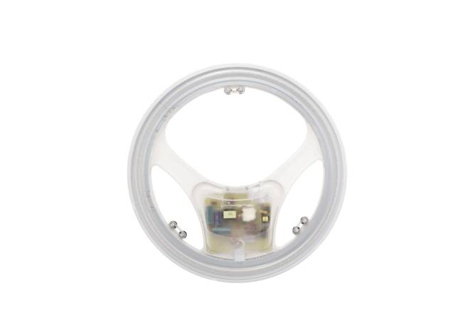 Eine runde LED-Leuchtenröhre mit einem sichtbaren zentralen Befestigungsbereich. Das Design ist einfach und modern und wird häufig für energieeffiziente Beleuchtungslösungen verwendet.