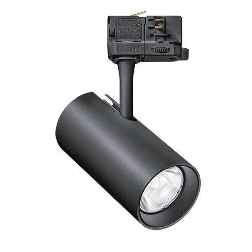 Ein schwarzes, zylindrisches Schienenlicht mit verstellbarem Kopf und Montageklammer, das für gerichtete Beleuchtung in Wohn- oder Geschäftsräumen verwendet wird.