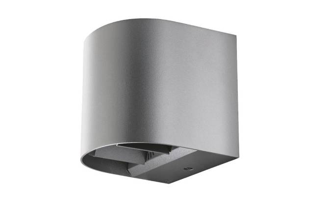 Eine moderne, zylindrische graue Wandleuchte mit minimalistischem Design, die eine kleine Glühbirne und schlanke Konturen aufweist.