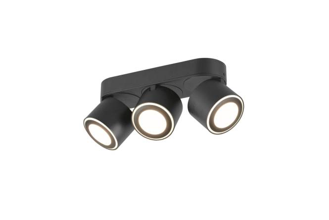 Eine schwarze Deckenleuchte mit drei Köpfen und runden weißen Leuchten, die in verschiedene Richtungen zeigen.