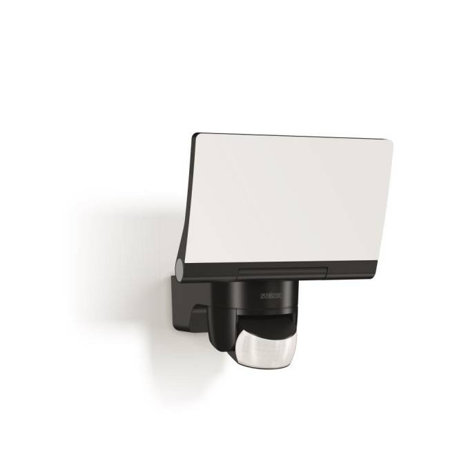 Modernes, wandmontiertes Außenlicht mit Bewegungsmelder in elegantem schwarz-weißem Design, geeignet für Sicherheit und Komfort.