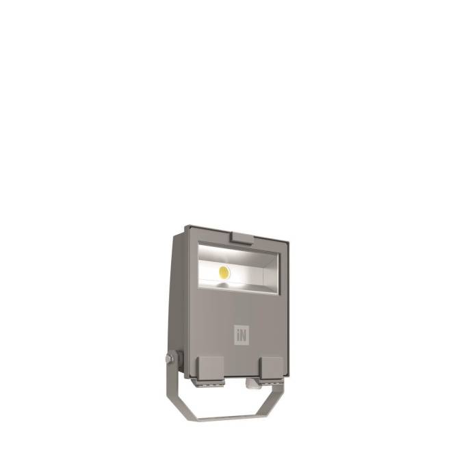 Ein modernes, rechteckiges LED-Flutlichtgerät mit Griff, für den Außeneinsatz konzipiert, montiert auf einer einfachen Stützstruktur.