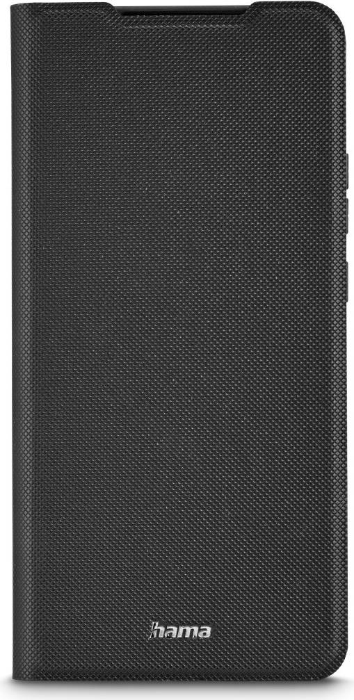 Ein strukturiertes, schwarzes Hardcover-Buch oder Notizbuch, von vorne betrachtet, das sein körniges Oberflächenmuster zur Schau stellt.