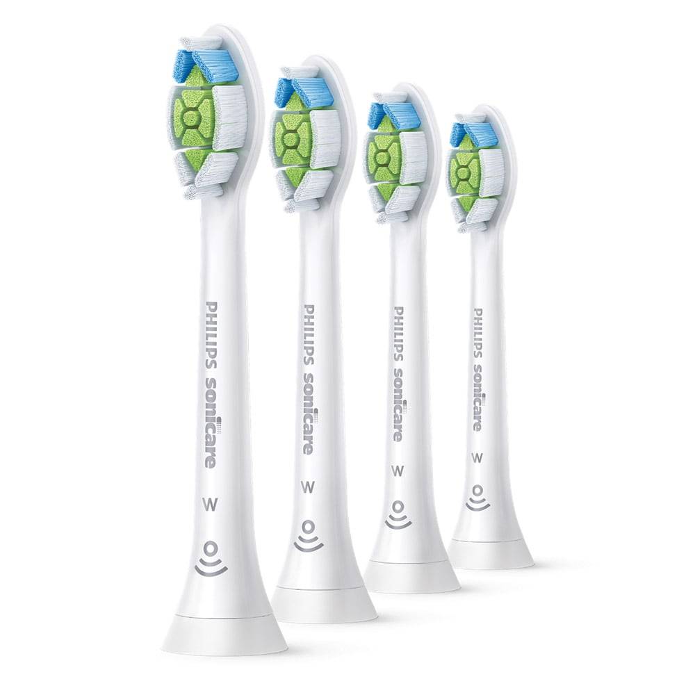 Satz aus vier weißen Philips Sonicare elektrischen Zahnbürstenkopfen mit grünen und blauen Borsten in einer Reihe angeordnet.
