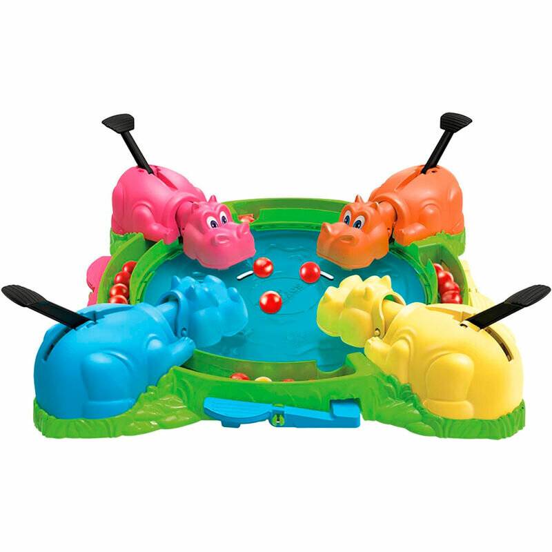 Ein farbenfrohes Tischspiel mit vier Nilpferden rund um einen Teich, jedes mit Hebeln, um rote Bälle zu fangen, die in der Mitte verstreut sind.
