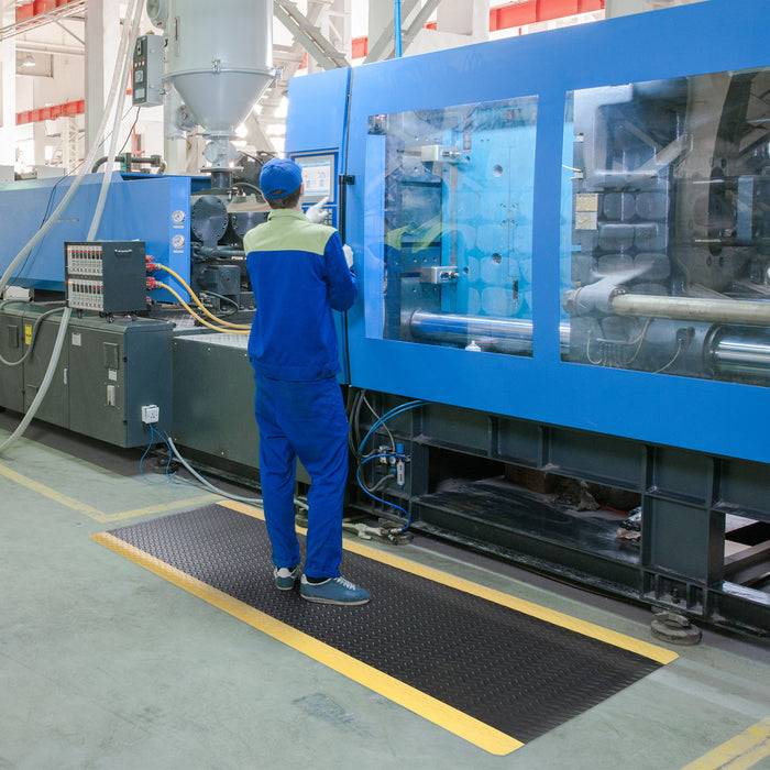 FLOORDIREKT Anti-Ermüdungsmatte Dyna-Protect Diamond - Dämpfende Arbeitsmatte - Entlastung für Gelenke & Wirbelsäule - 100 x 120 cm - Schwarz-Gelb