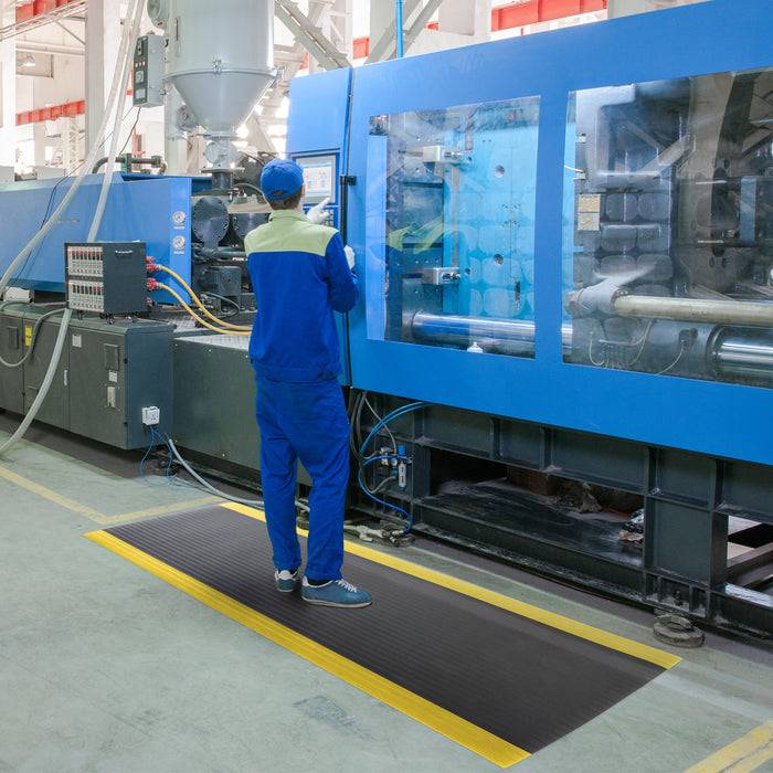 FLOORDIREKT Anti-Ermüdungsmatte Softer-Work-Mat - Dämpfende Arbeitsmatte - Entlastung für Gelenke & Wirbelsäule - 50 x 60 cm - Schwarz-Gelb