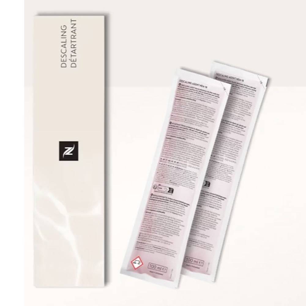 Produktverpackung für ein Entkalkungsmittel: eine hohe weiße Schachtel mit der Aufschrift „DESCALING DÉTARTRANT