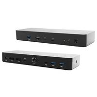 Zwei abgewinkelte Ansichten einer kleinen silber-schwarzen Desktop-Docking-Station oder eines Hubs mit vorderen Anschlussleisten, Anzeigelampen und einem Power-Button.