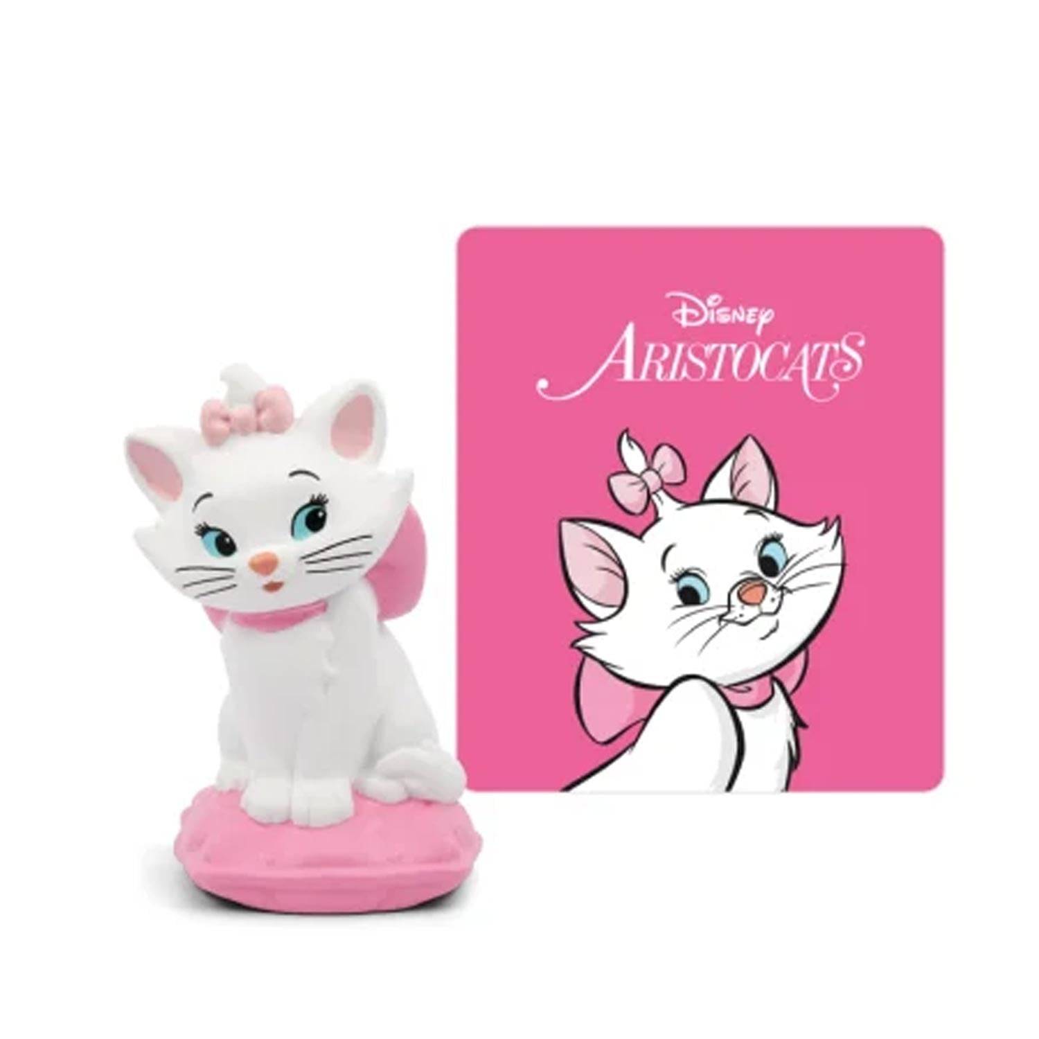 Marie, das weiße Kätzchen-Figurchen auf rosa Sockel, neben einer rosa Disney-Karte „The Aristocats