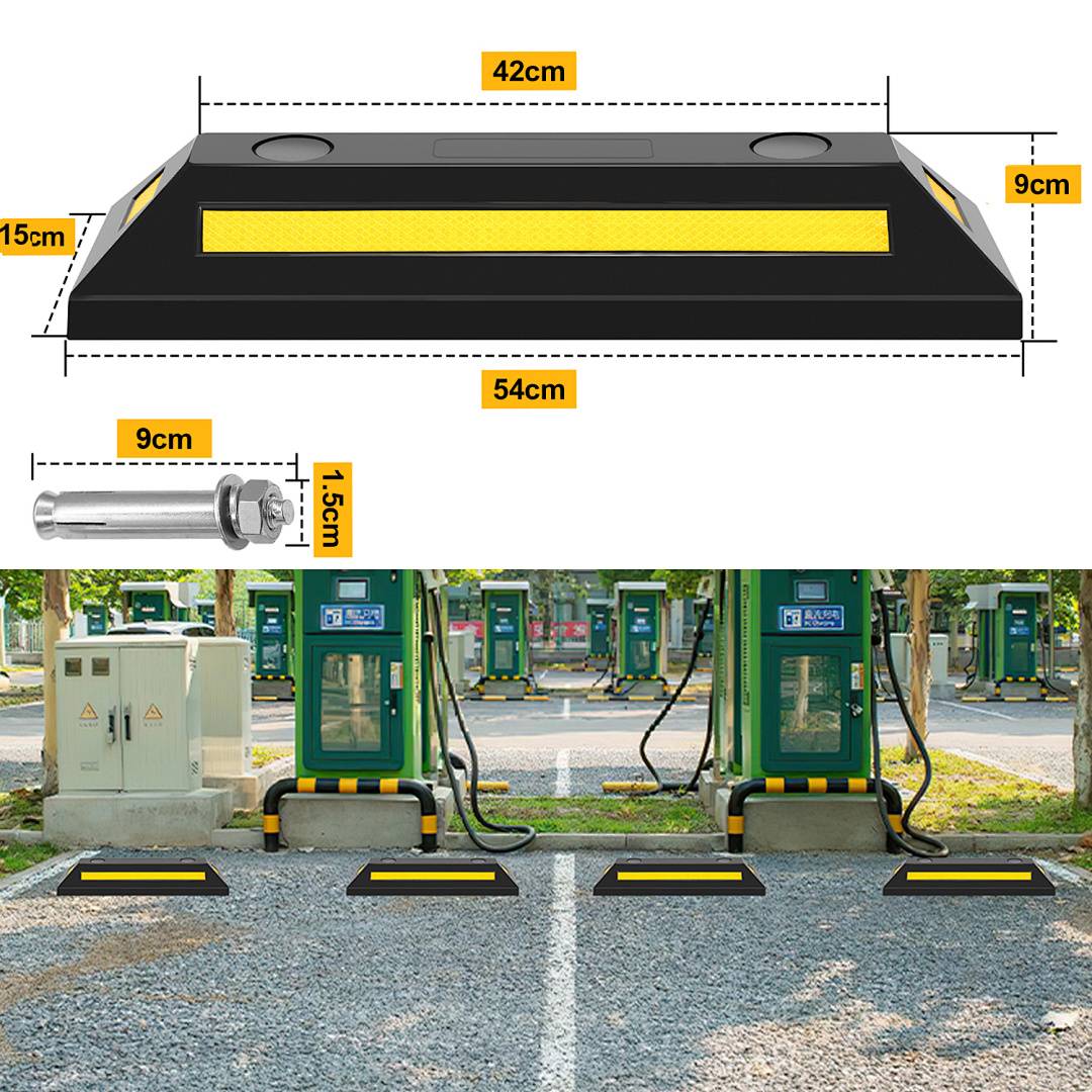 Abmessungen und Installationsbeispiel für eine flache gelb-schwarze Geschwindigkeitsbremse: 54 cm lang, 42 cm Breite oben, 15 cm Seitenhöhe, 9 cm hoch, mit gezeigtem Ankerschraube; installiert über eine Tankstellenspur.