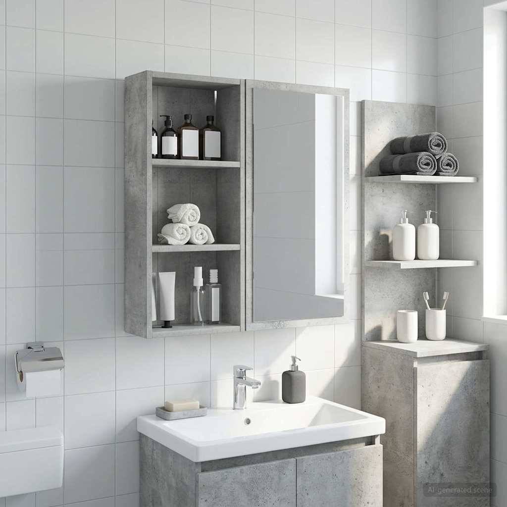 Modernes Badezimmer-Waschtisch mit Waschbeckenschrank in Betonoptik, Spiegelschrank, Wandregale, Handtücher, Flaschen und Accessoires auf weißen Fliesenwänden.