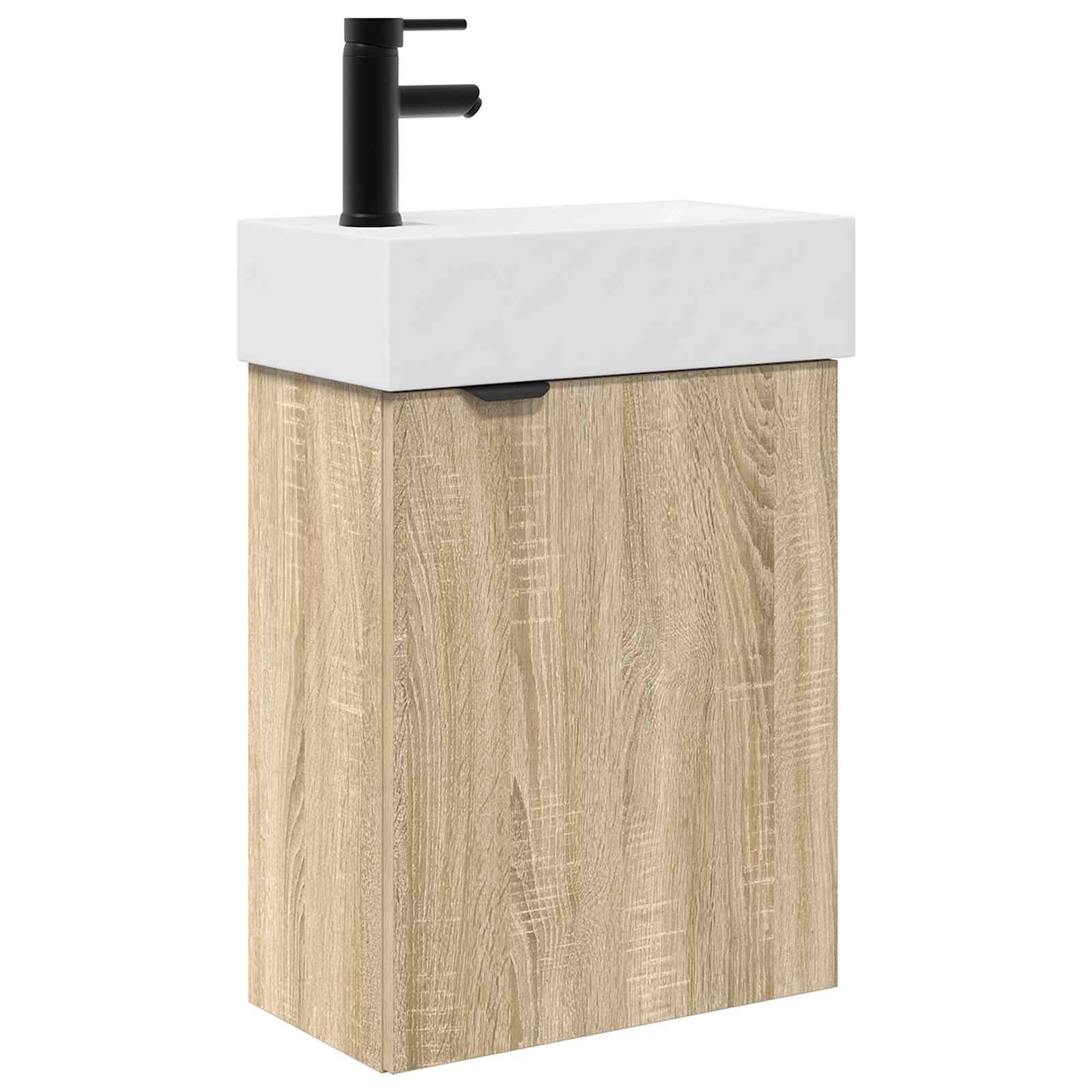 Moderner an der Wand montierter Badezimmerwaschtisch mit weißem Waschbecken, schwarzem Wasserhahn und hellem Holzschrank