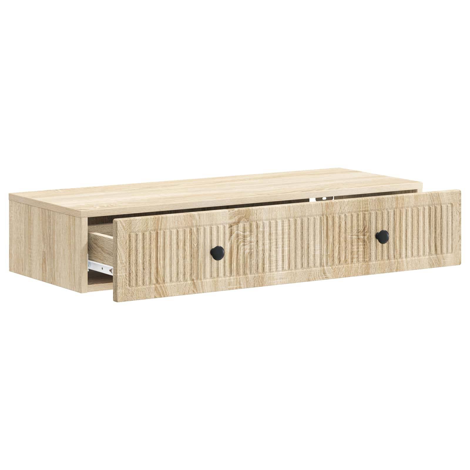 Helle Holz-Schubladeneinheit in Rechteckform mit einer teilweise geöffneten Schublade, die schwarze runde Knöpfe und eine gerillte Frontplatte zeigt.