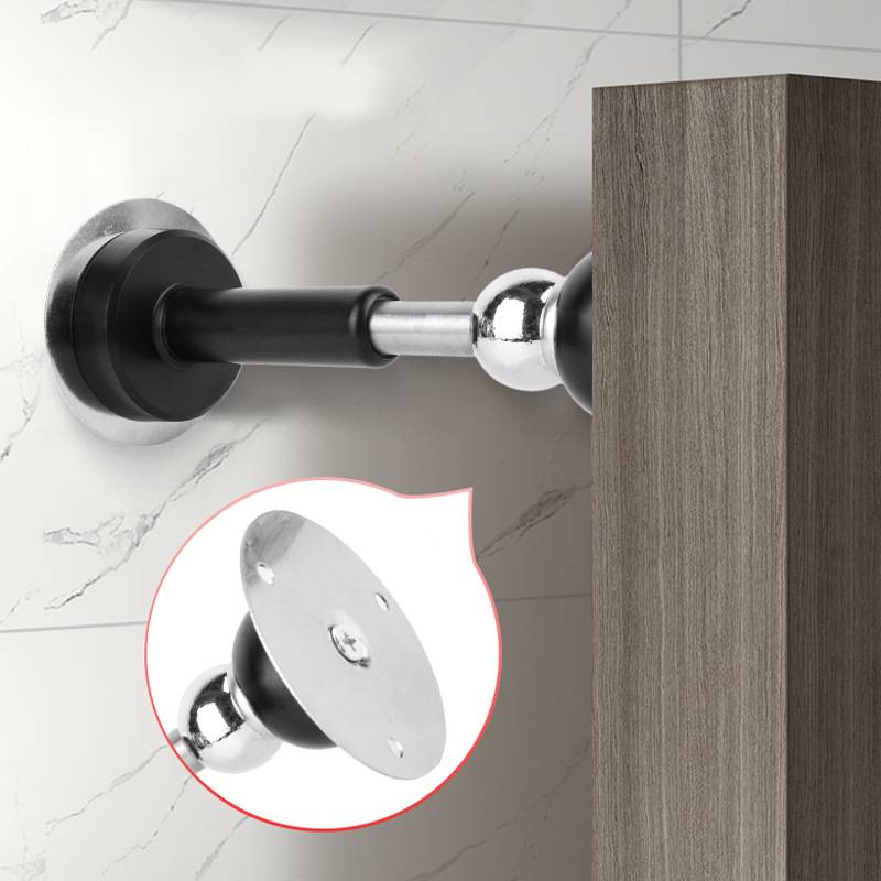 Nahaufnahme eines wandmontierten Metalltürstopper, der eine Tür offen hält, mit einer eingefügten Detailansicht der runden Montagebasis und der Schraube.