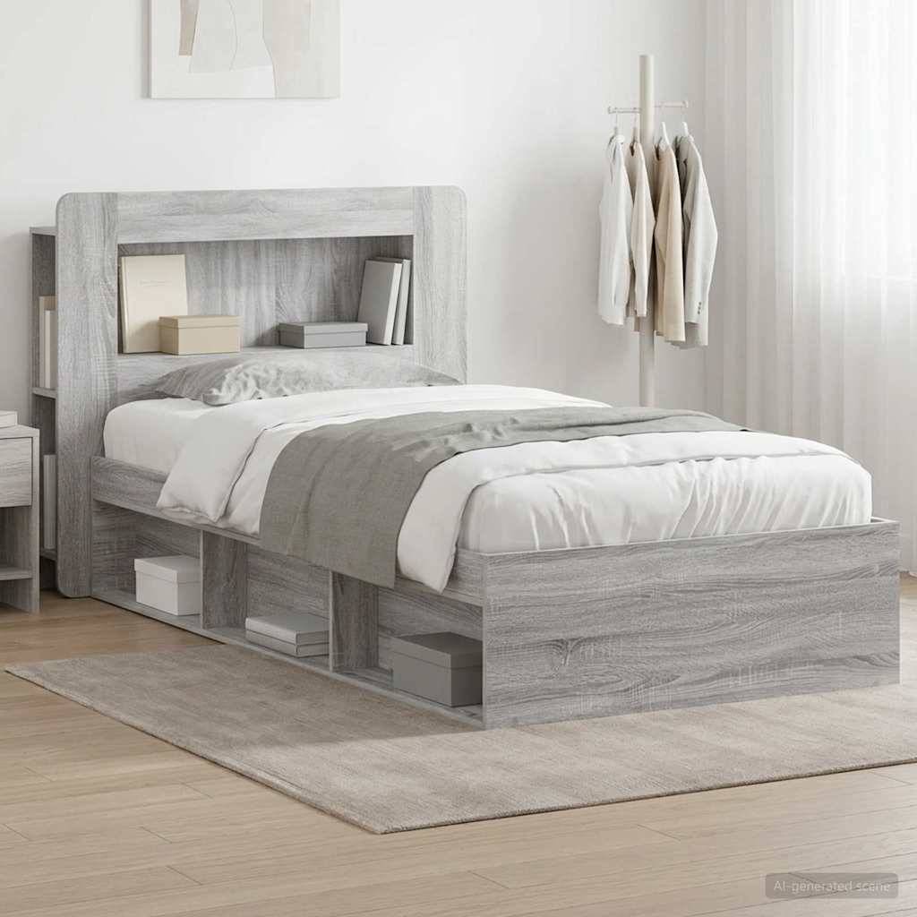 Graues Holz-Einzelbett mit integriertem Kopfteil-Regal und Aufbewahrungsbehältern unter dem Bett in einem minimalistischen Schlafzimmer.